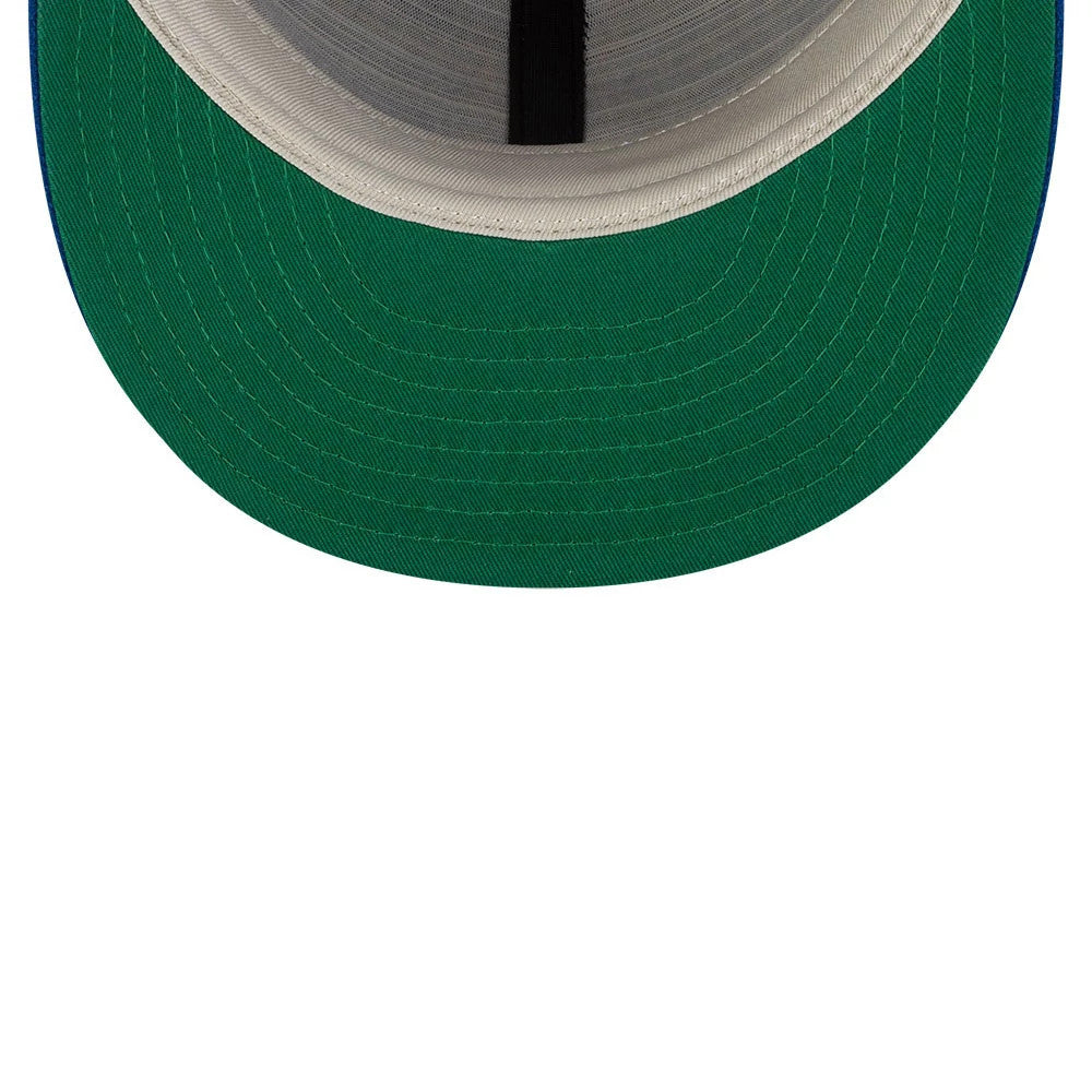 New York Mets FOG X MLB Blue Retro Crown New Era 59FIFTY Fitted Cap, inside view showing the green undervisor, grey internal taping across the structured crown, and black sweatband lining the edge.
