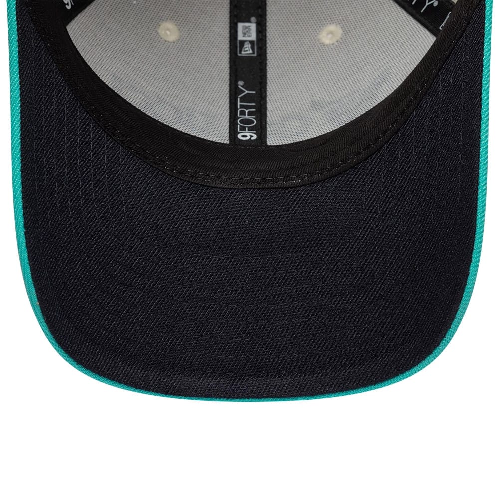 Pictured is this Colucci X New Era 9FORTY cap in white. 2
