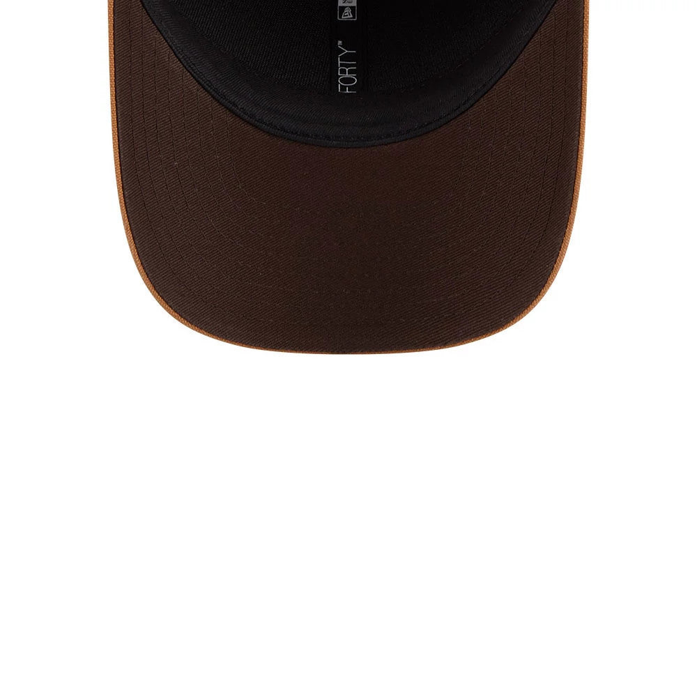 New Era Beige 9FORTY M-Crown Adjustable Cap, inside view showing the black sweatband and taping with The 9FORTY logo, complemented by a contrast brown undervisor seamlessly attached to the structured visor.