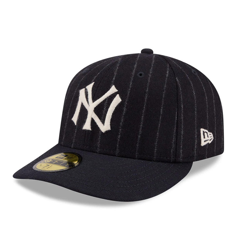 New York Yankees MLB X Moon Navy New Era 59FIFTY Fitted Cap, three-quarter view showing the white raised embroidered NY logo on the front panel, grey pinstripes across the navy crown, and New Era flag logo on the left side.