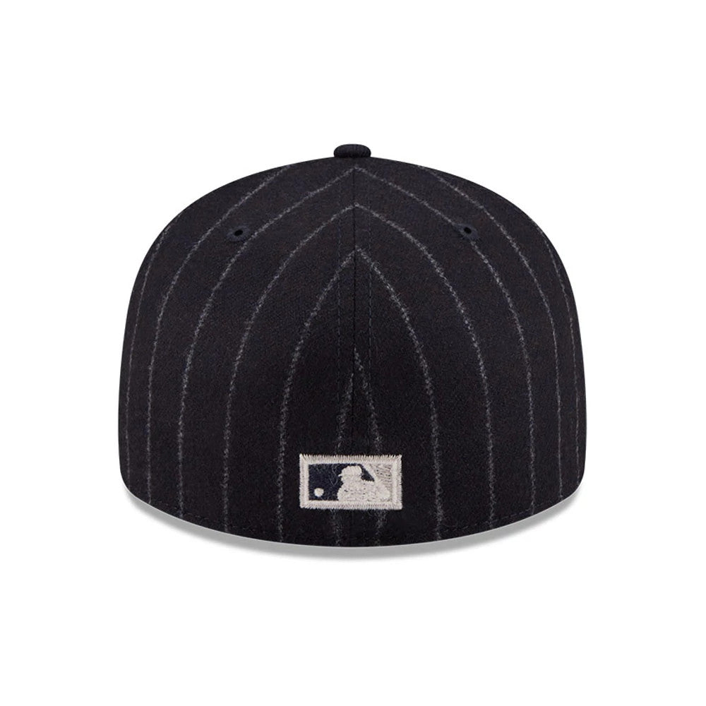 Seattle Mariners MLB X Moon Navy New Era 59FIFTY Fitted Cap, rear view showing the white embroidered MLB Batterman logo at the centre of the back panels, with grey pinstripes on the navy fabric.