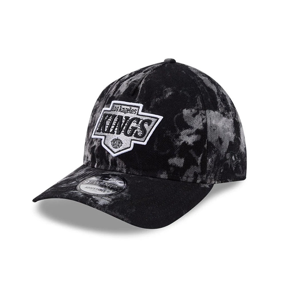 LA Kings NHL Bleached Denim Black New Era 9TWENTY A-Frame Adjustable Cap, three-quarter view displaying the raised white embroidered Kings logo on the front panel, with a curved visor and a 9TWENTY size sticker.