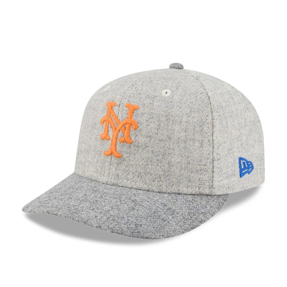 New York Mets MLB X Moon Light Beige New Era 59FIFTY Fitted Cap, front view showing the orange raised embroidered Mets logo on the front panel, with a grey visor and a blue New Era flag logo on the left side.