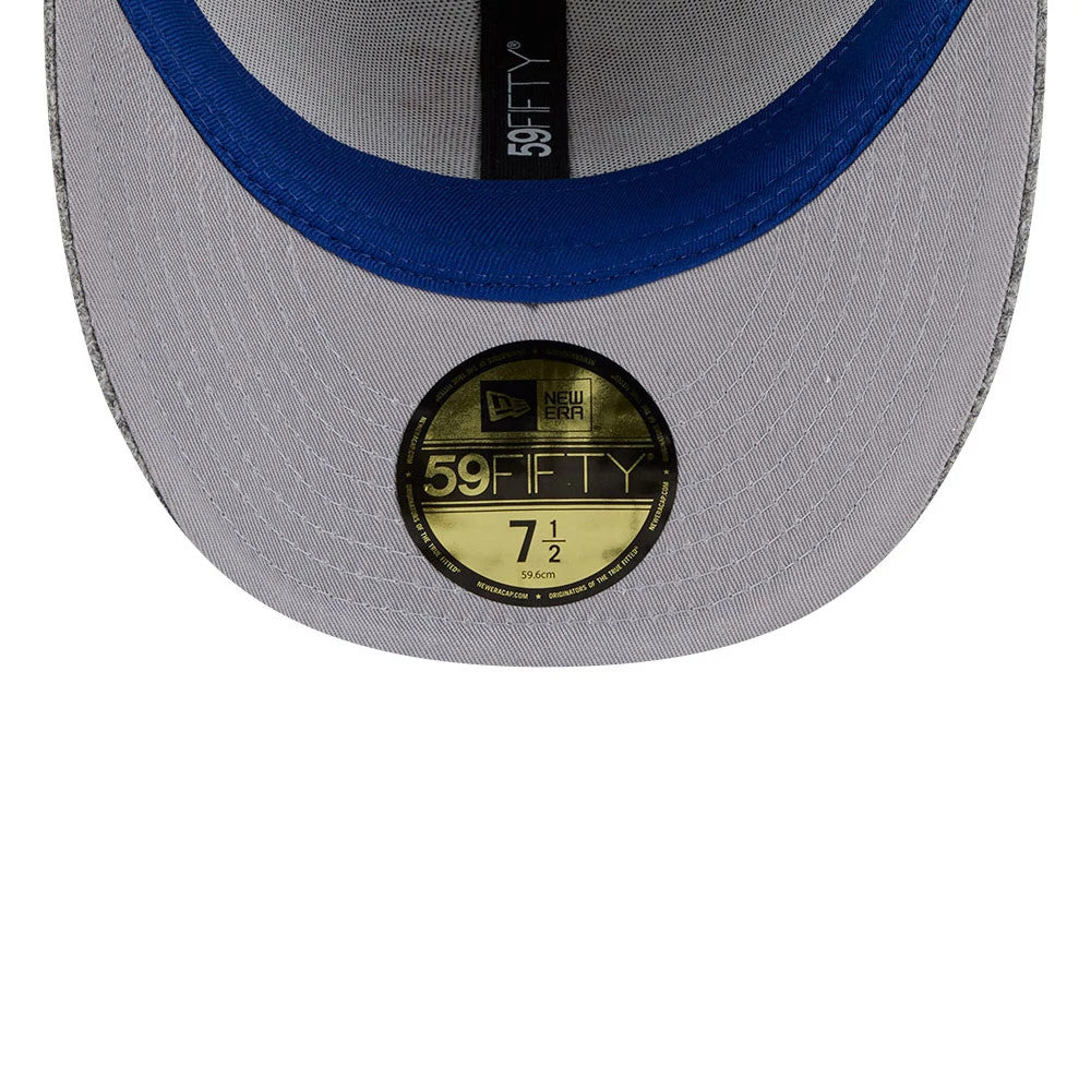 New York Mets MLB X Moon Light Beige New Era 59FIFTY Fitted Cap, inside view showing a blue sweatband, grey undervisor with a gold 59FIFTY size sticker, and black taping with white branding down the centre.