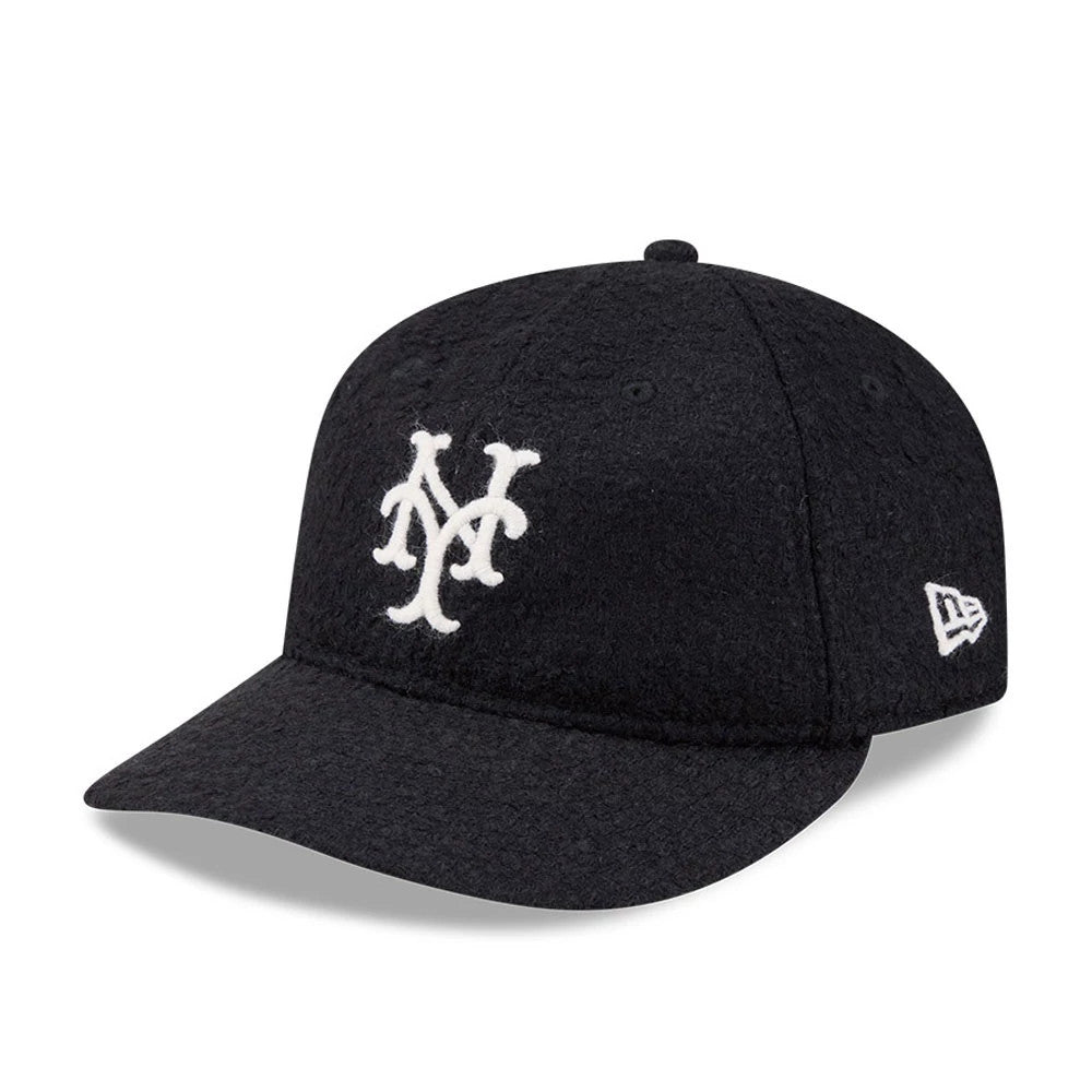 New York Mets MLB X Moon Navy Retro Crown New Era 9FIFTY Adjustable Cap, three-quarter view showing a white embroidered Mets logo on the front panel and the New Era flag logo on the left side of the soft, unstructured navy crown with a curved visor.