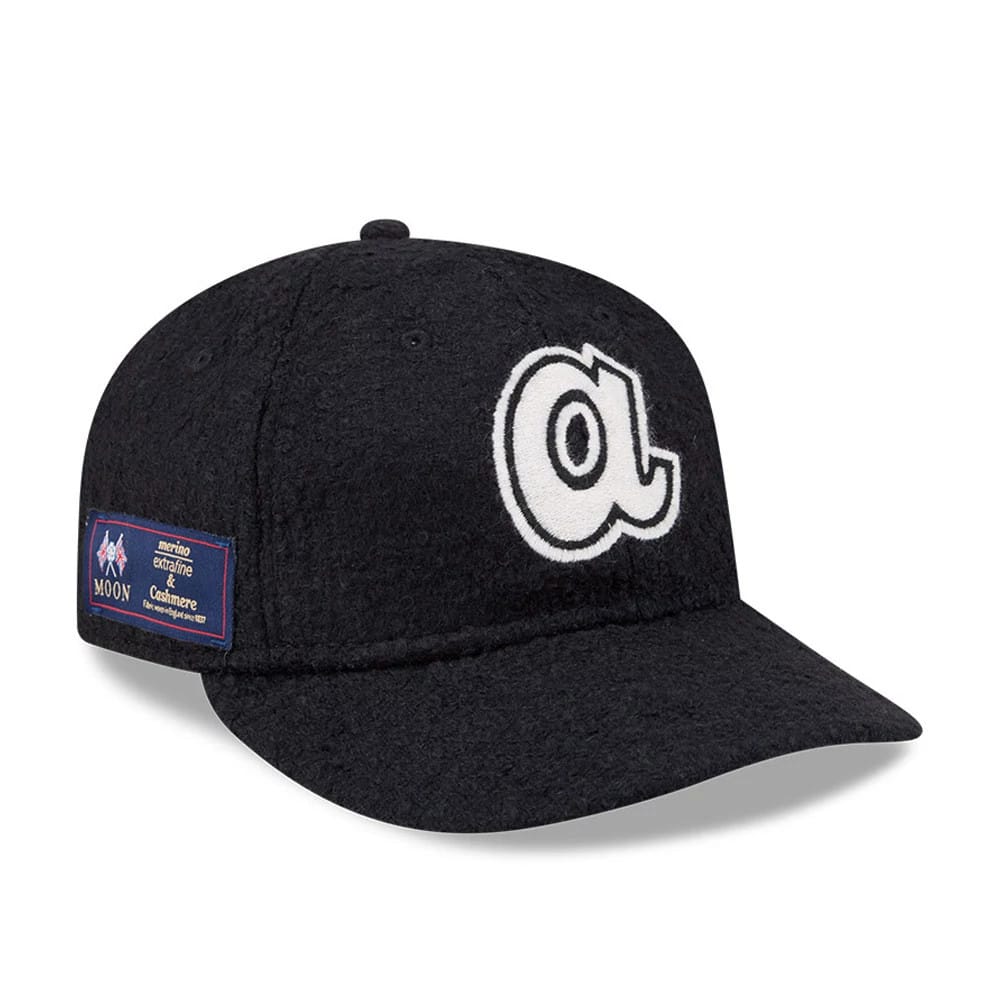 Pictured is this MLB X Moon Atlanta Braves Retro Crown 9FIFTY cap in navy. 1
