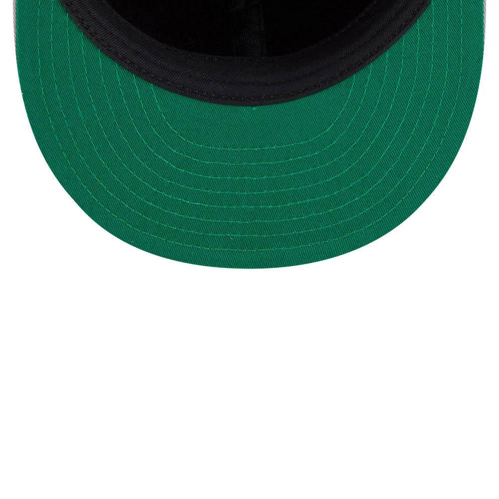Chicago White Sox MLB Felt Logo Black Retro Crown New Era 59FIFTY Fitted Cap, inside view showing a green undervisor with detailed stitching, complemented by a black sweatband along the inner edge of the structured crown.