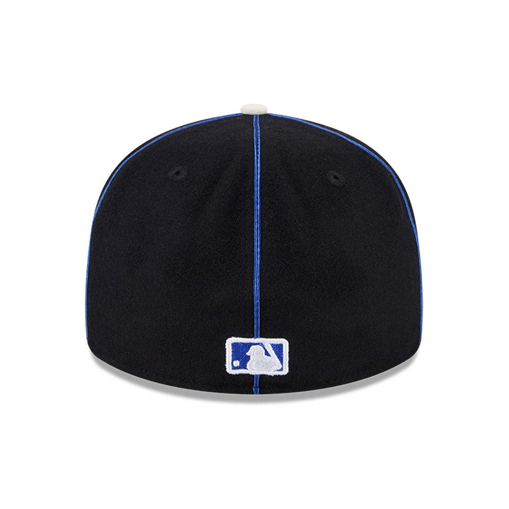 New York Mets MLB Felt Logo Blue Retro Crown New Era 59FIFTY Fitted Cap, rear view showing the white and blue embroidered MLB Batterman logo centred on the back panels, with a black crown highlighted by blue piping.