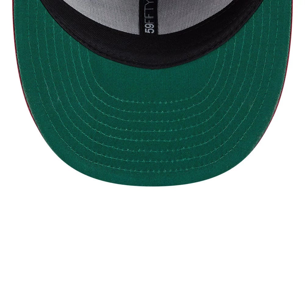 Athletics MLB Team Cards Black New Era 59FIFTY Fitted Cap, inside view showing green undervisor, black sweatband, and polyester taping with 59FIFTY branding, highlighting the cap's structured interior design.