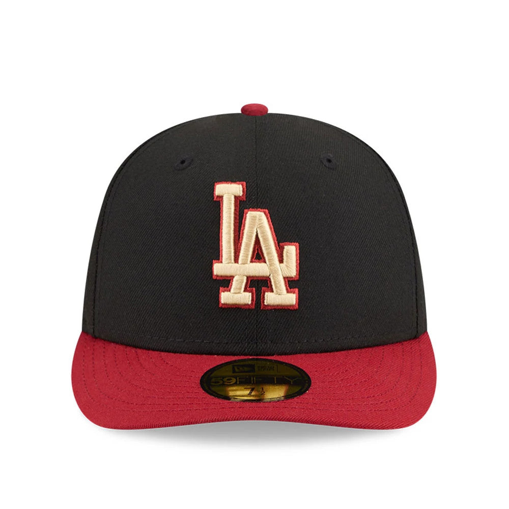 LA Dodgers MLB Team Cards Black New Era 59FIFTY Fitted Cap, front view showing raised cream LA logo outlined in red embroidery on the structured black crown, featuring a red flat visor and gold 59FIFTY size sticker underneath.