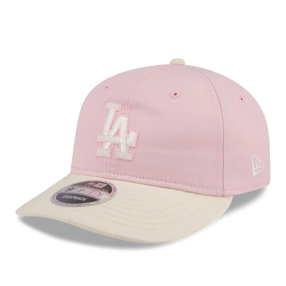 LA Dodgers MLB Washed Tie Dye Pastel Pink New Era 9FIFTY Snapback Adjustable Cap, front view showing the raised white LA logo embroidered on the front panel, set above a cream flat visor with a 9FIFTY size sticker.