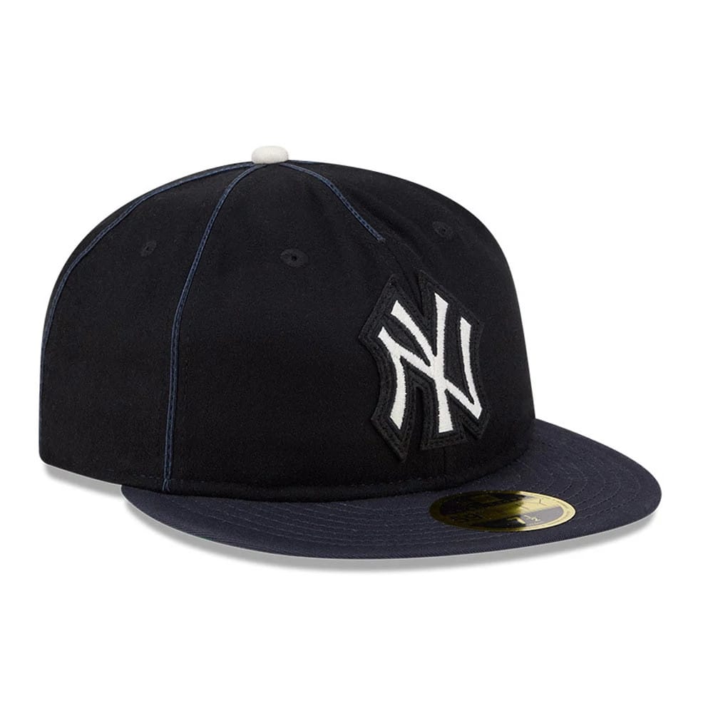 Pictured is this MLB Felt Logo New York Yankees Retro Crown 59FIFTY Fitted cap in navy. 4
