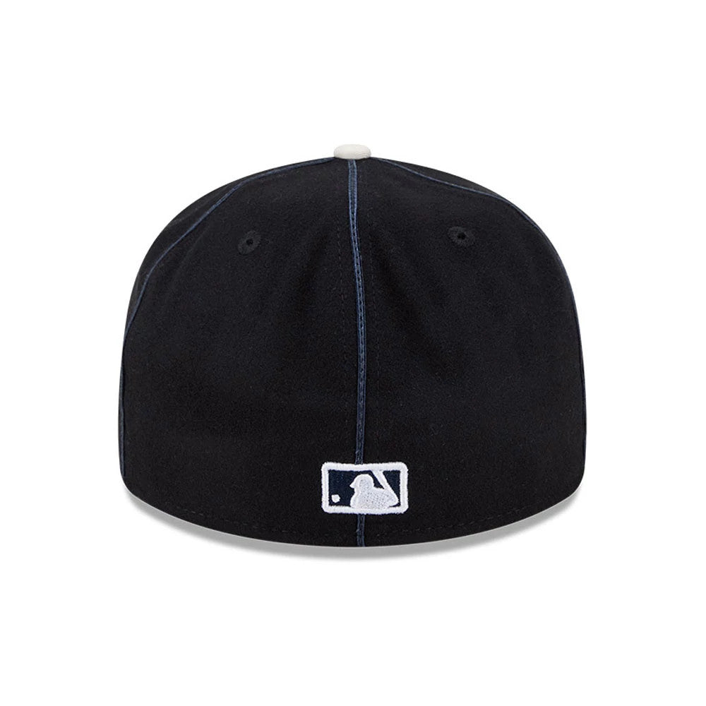 Pictured is this MLB Felt Logo New York Yankees Retro Crown 59FIFTY Fitted cap in navy. 7