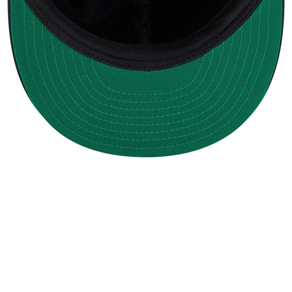 New York Yankees MLB Felt Logo Navy Retro Crown New Era 59FIFTY Fitted Cap, inside view showing the green undervisor contrasting with the black sweatband, and black taping running along the seams of the cap.
