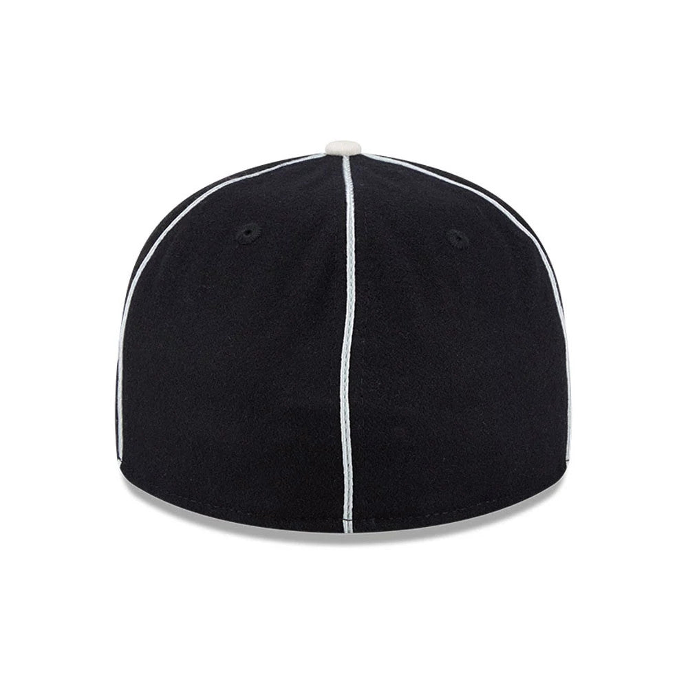 Pictured is this NHL Felt Logo LA Kings Retro Crown 59FIFTY Fitted cap in black. 7