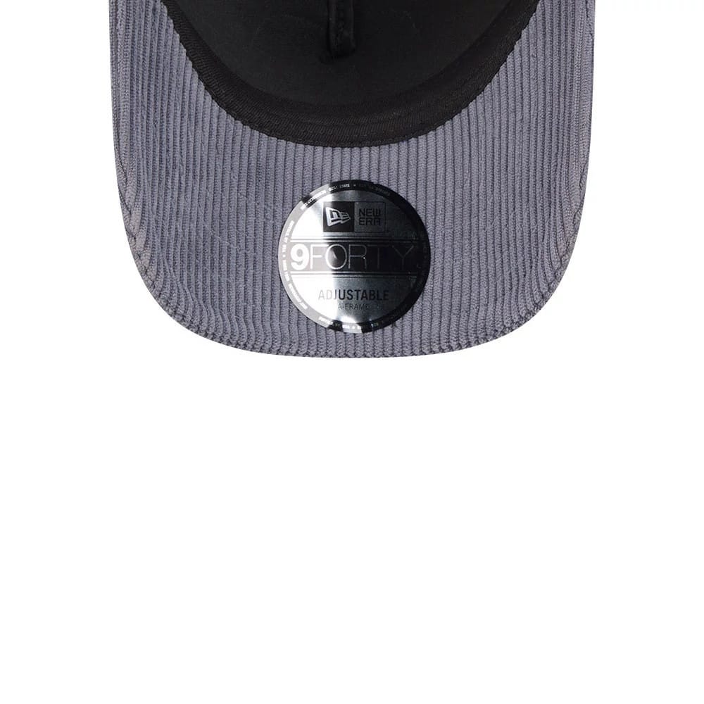 Pictured is this New Era Wide Cord 9FORTY A-Frame Trucker cap in dark blue. 7