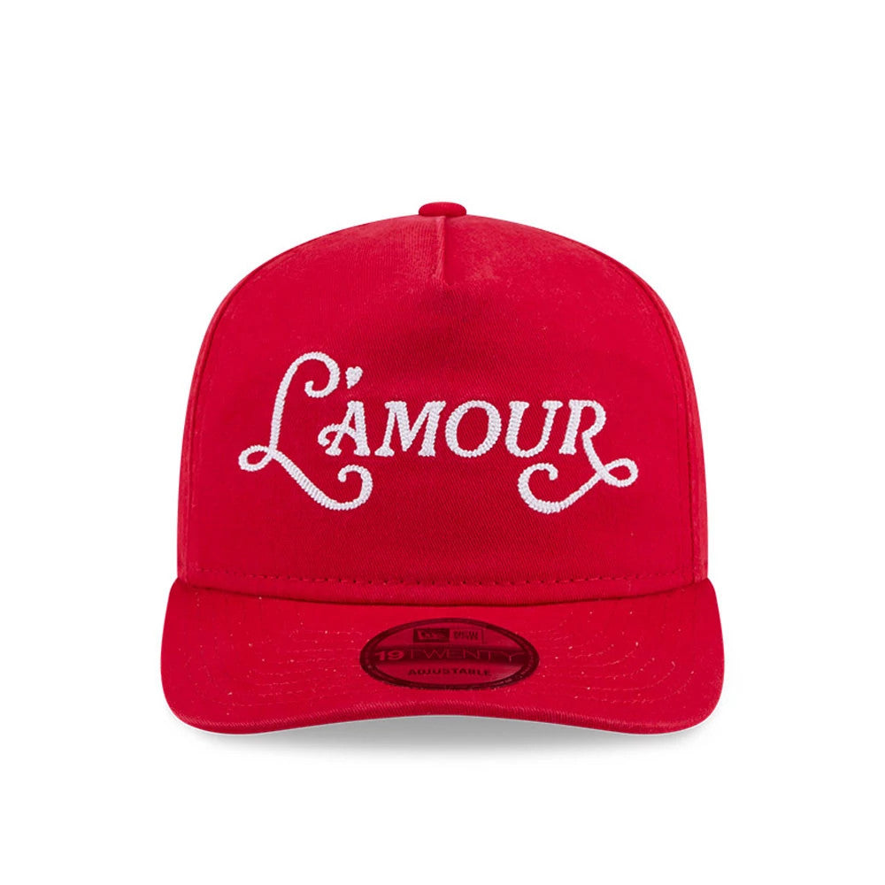 New Era L'amour Red New Era 19TWENTY Adjustable Cap, front view showing white L'amour lettering in raised embroidery on the red crown, a matching red visor, and a 19TWENTY size sticker on the centre of the visor.