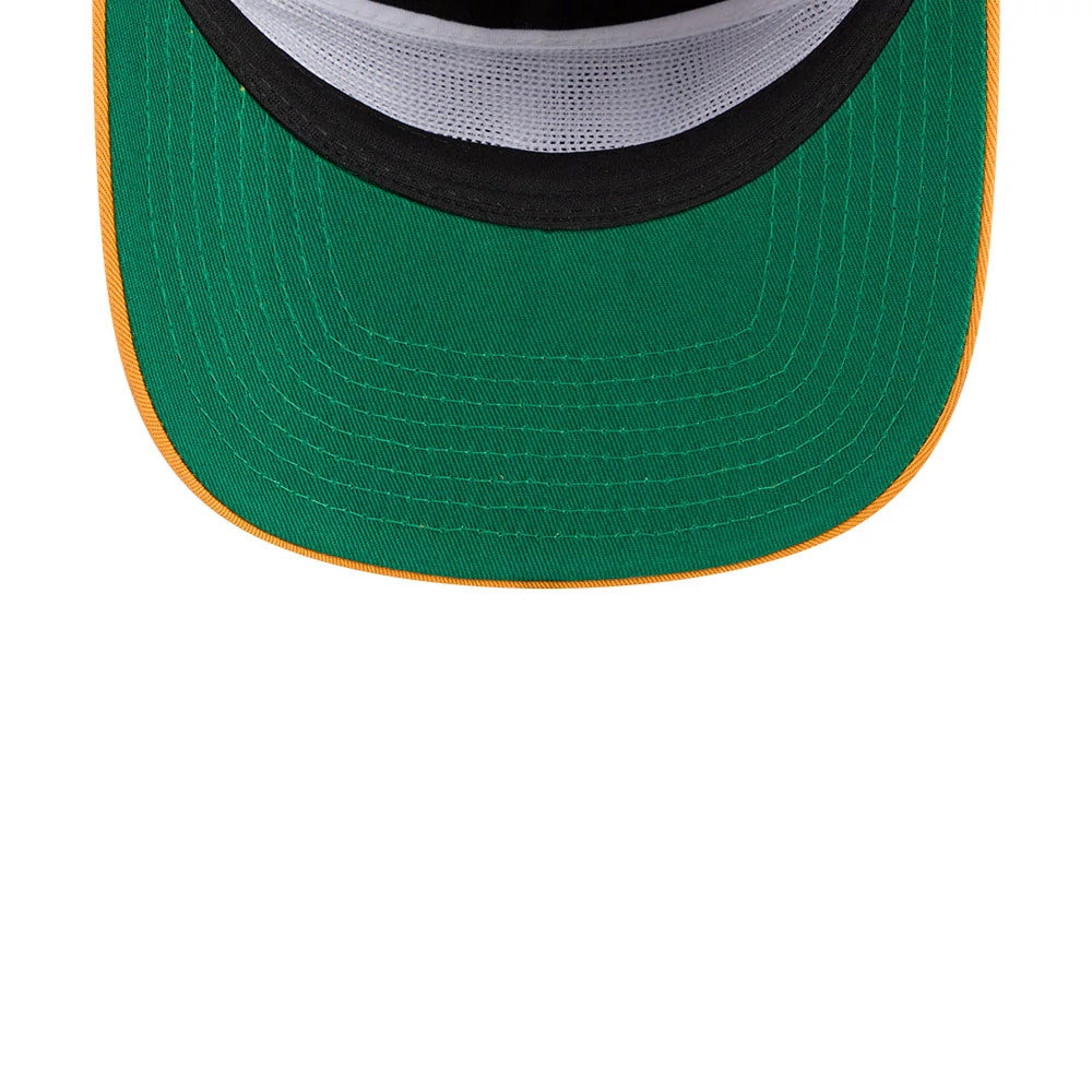 Boston Bruins NHL Felt Logo Black New Era 19TWENTY Adjustable Cap, inside view showing the green undervisor with detailed stitching, a black sweatband contrasting with white internal mesh lining, and an orange edge on the visor.