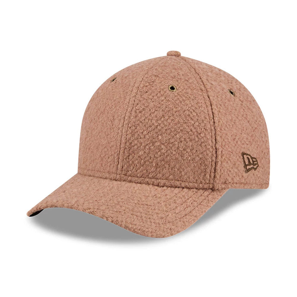 New Era Brushed Fleece Brown 9FORTY M-Crown Adjustable Cap, front view showing the textured brown fabric with a curved visor and the embroidered New Era flag logo on the left side, complete with matching eyelets and top button.