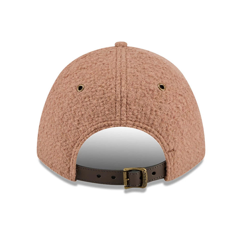 New Era Brushed Fleece Brown 9FORTY M-Crown Adjustable Cap, rear view showing a textured brown fleece finish with a dark brown adjustable strap and brass buckle closure, along with two eyelets on the back panels.