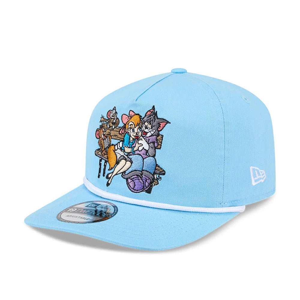 Tom & Jerry Serenade Pastel Blue New Era 19TWENTY Adjustable Cap, front view showing an embroidered Tom, Jerry, and friends design on the front panel, with a flat blue visor featuring a 19TWENTY size sticker.