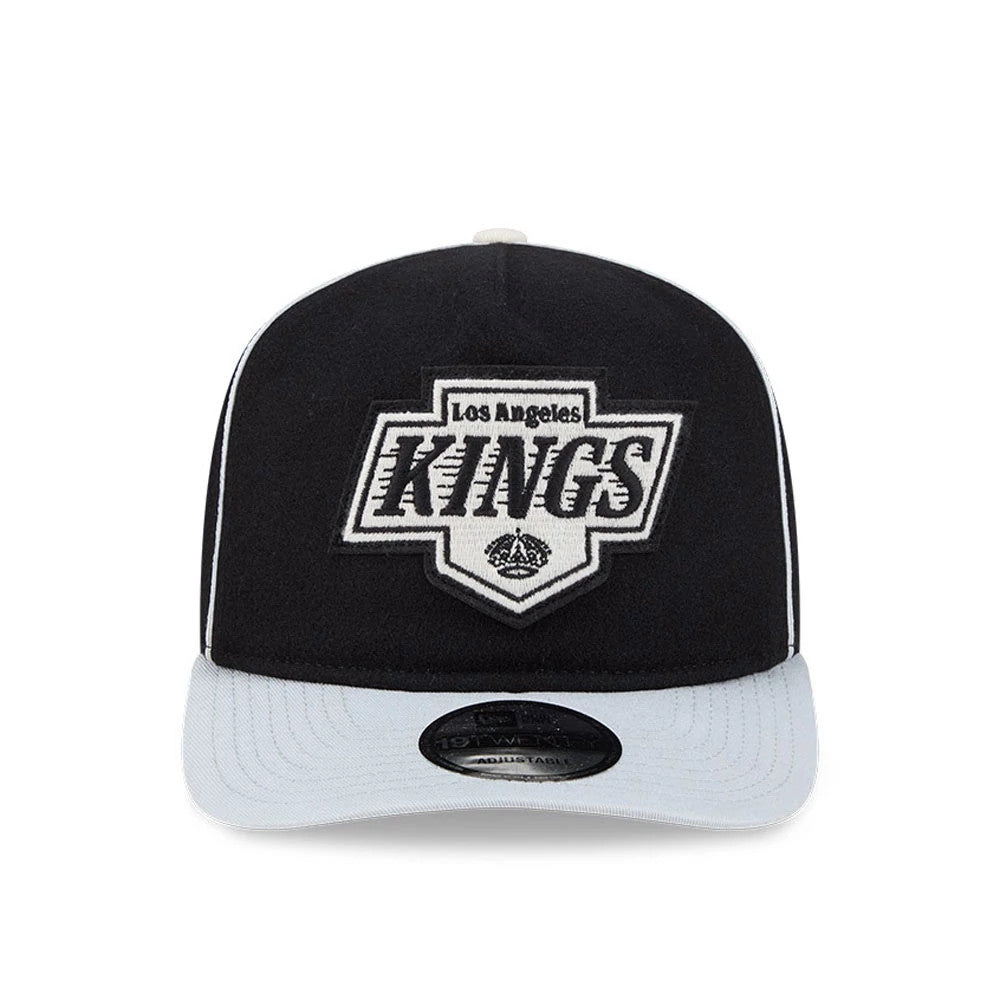 LA Kings NHL Felt Logo Black New Era 19TWENTY Adjustable Cap, front view showing raised grey LA Kings felt logo embroidered on the structured black crown, with contrasting grey visor and centred 19TWENTY size sticker on the visor.