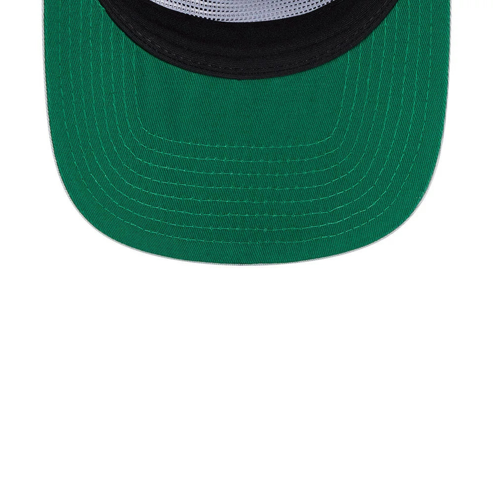 LA Kings NHL Felt Logo Black New Era 19TWENTY Adjustable Cap, inside view showing a green undervisor, detailed stitching across the black interior panels, and a contrasting black sweatband around the crown.