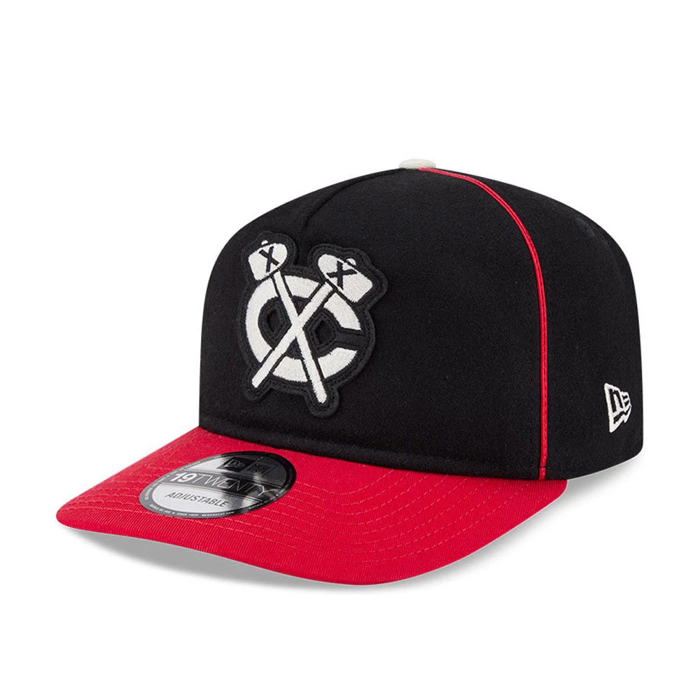 Chicago Blackhawks NHL Felt Logo Black New Era 19TWENTY Adjustable Cap, front view showing a prominent black and white embroidered felt logo on the structured crown, with a red visor and a grey 19TWENTY size sticker.