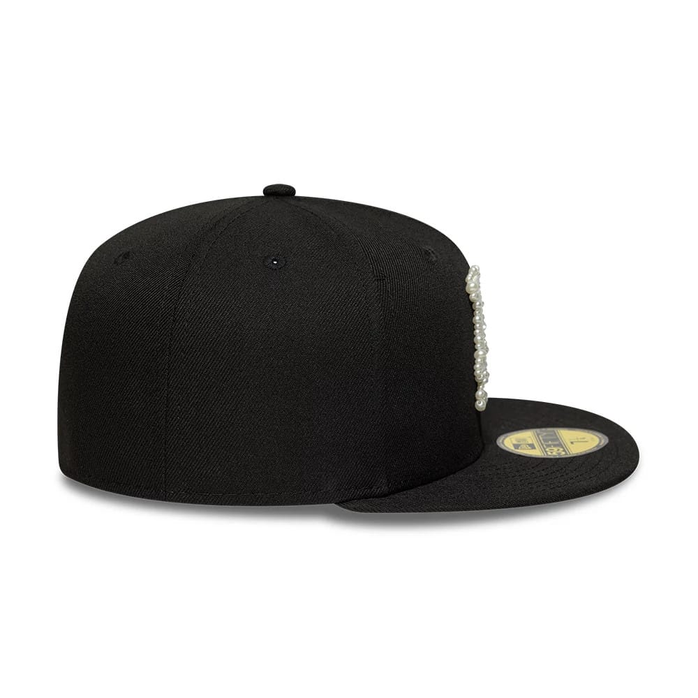 Pictured is this MLB Faux Pearl LA Dodgers 59FIFTY Fitted cap in black. 7