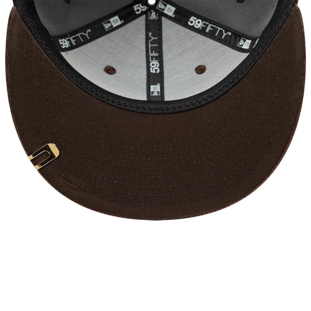 Pictured is this New Era Faux Pony 59FIFTY Fitted cap in dark brown. 7