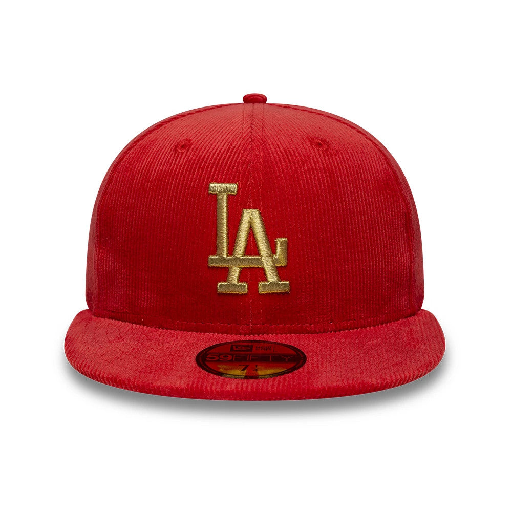 LA Dodgers MLB Cord Red New Era 59FIFTY Fitted Cap, front view showing the gold embroidered LA logo on the structured red corduroy crown, with a flat red visor and a gold 59FIFTY size sticker on top.