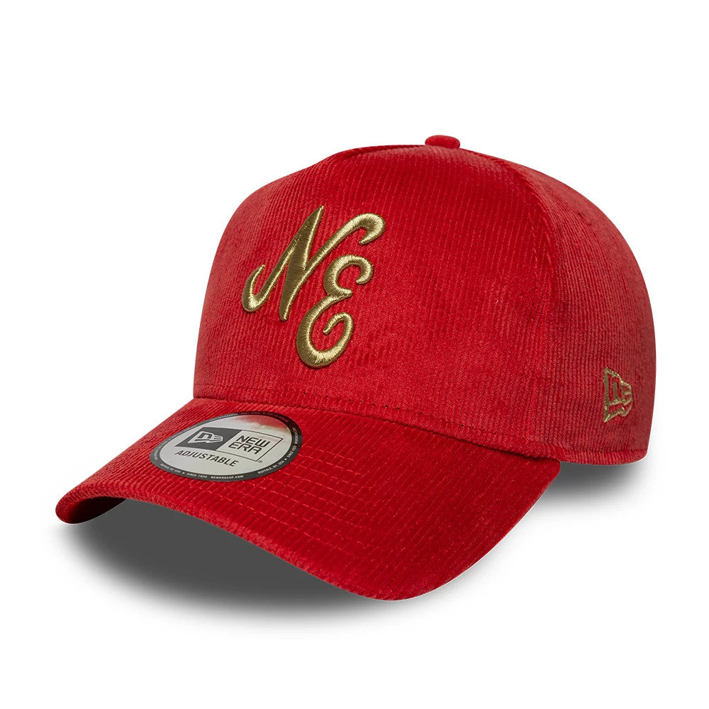 New Era Cord Red 9FORTY E-Frame Adjustable Cap, three-quarter view showing gold embroidered NE lettering on the front panel, with a curved red visor featuring a New Era 9FORTY size sticker, and a New Era flag logo on the left side.