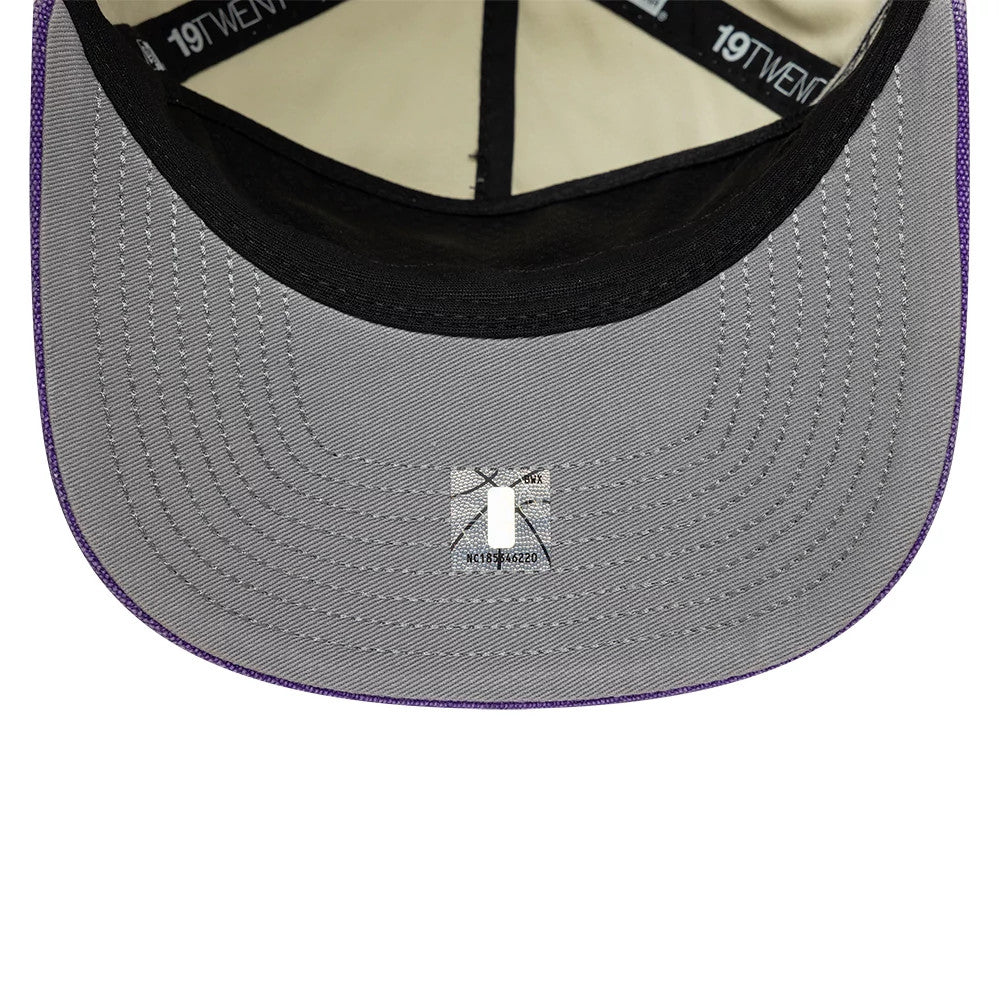 LA Lakers NBA Hardwood Classic Cream New Era 19TWENTY Adjustable Cap, inside view showing black taping with repeated 19TWENTY branding, a light grey undervisor, and a central sticker near the seam.