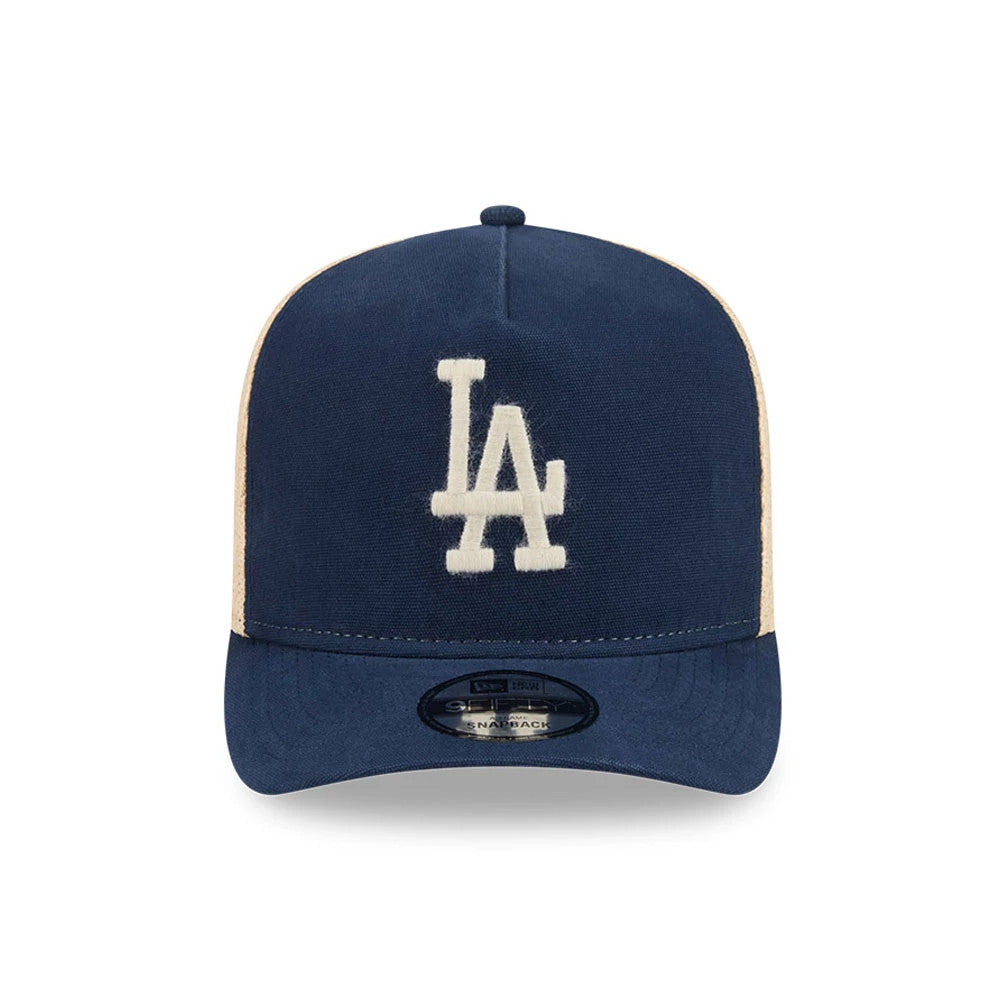 LA Dodgers MLB Grained Dark Blue New Era 9FIFTY A-Frame Snapback Adjustable Cap, front view showing the large white embroidered LA logo centred on the structured dark blue crown, with a dark blue curved visor and a 9FIFTY size sticker.