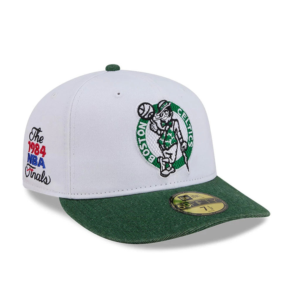 Boston Celtics NBA Hardwood Classic White New Era 59FIFTY Fitted Cap, three-quarter view showing the Boston Celtics mascot in raised embroidery on the front panel, green visor with gold 59FIFTY size sticker.