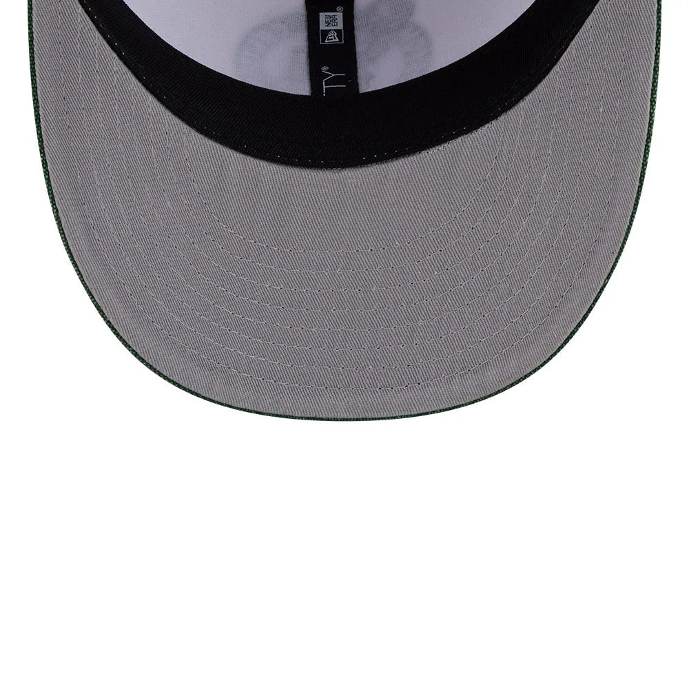 Boston Celtics NBA Hardwood Classic White New Era 59FIFTY Fitted Cap, inside view showing the grey undervisor with a black sweatband, a central black New Era taping with a size tag, and green stitching detail on the visor edge.