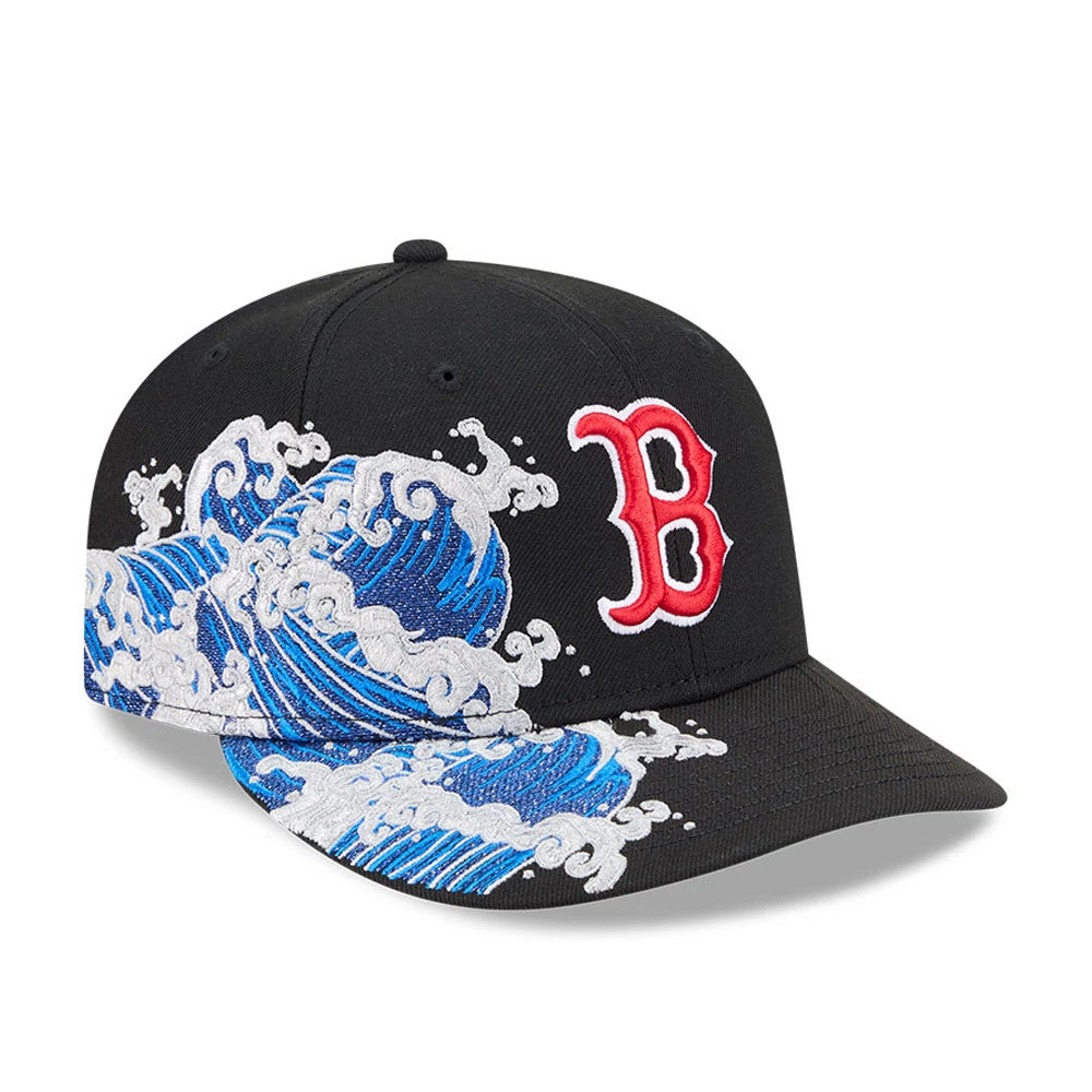 Boston Red Sox MLB Vissurf Black New Era 9FIFTY Snapback Adjustable Cap, three-quarter view showing the prominent red embroidered B logo on the front panel, blue and white wave graphic wrapping from the side panel to the black visor.