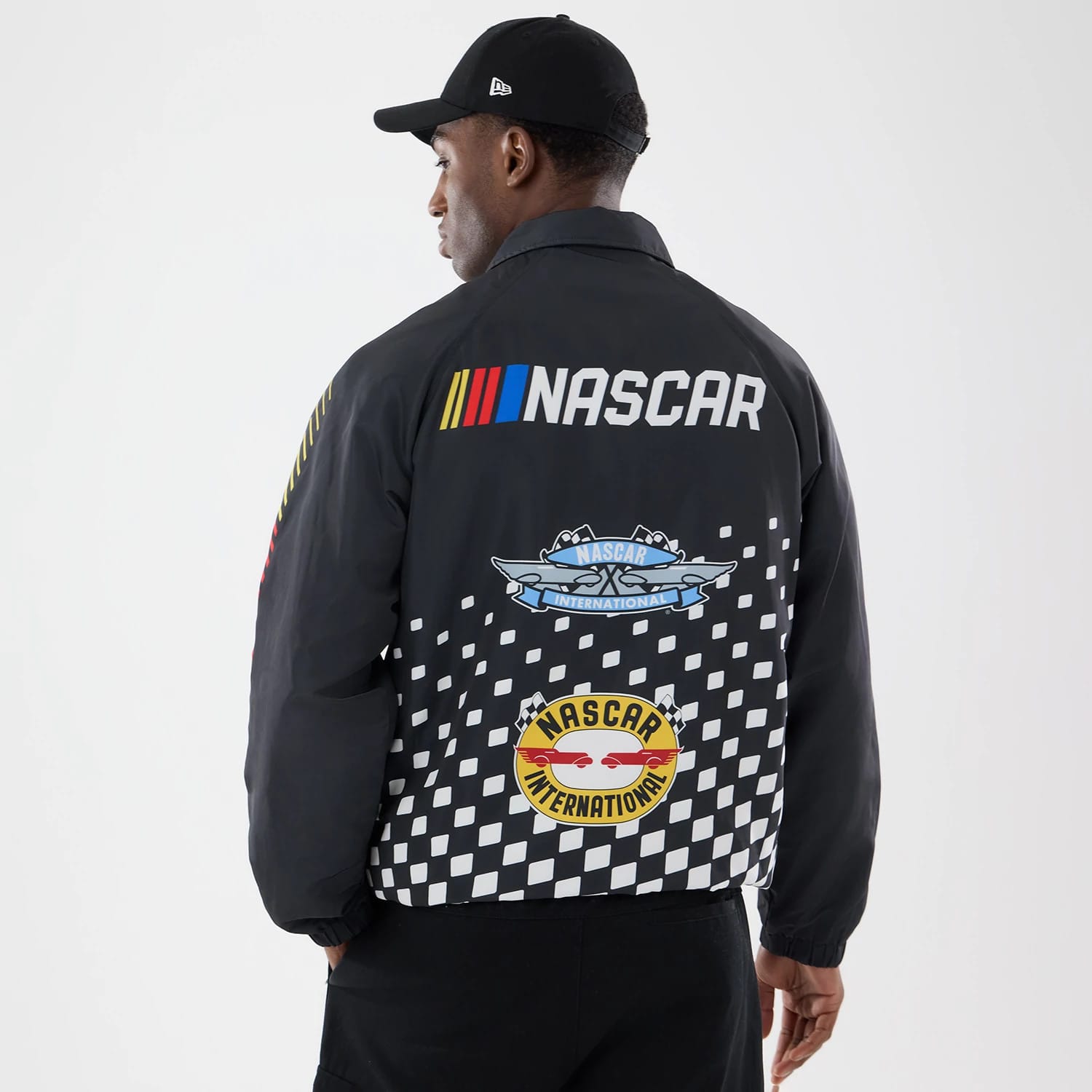 The model is wearing this Nascar Logo Jacket in black. 2