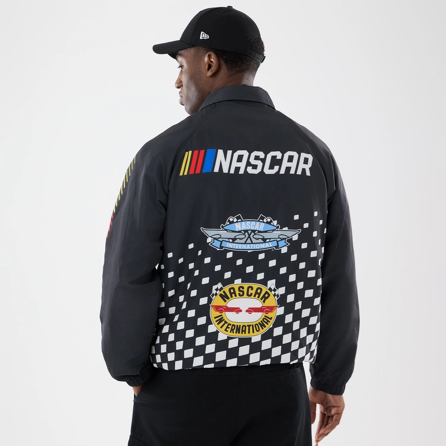 The model is wearing this Nascar Logo Jacket in black. 2
