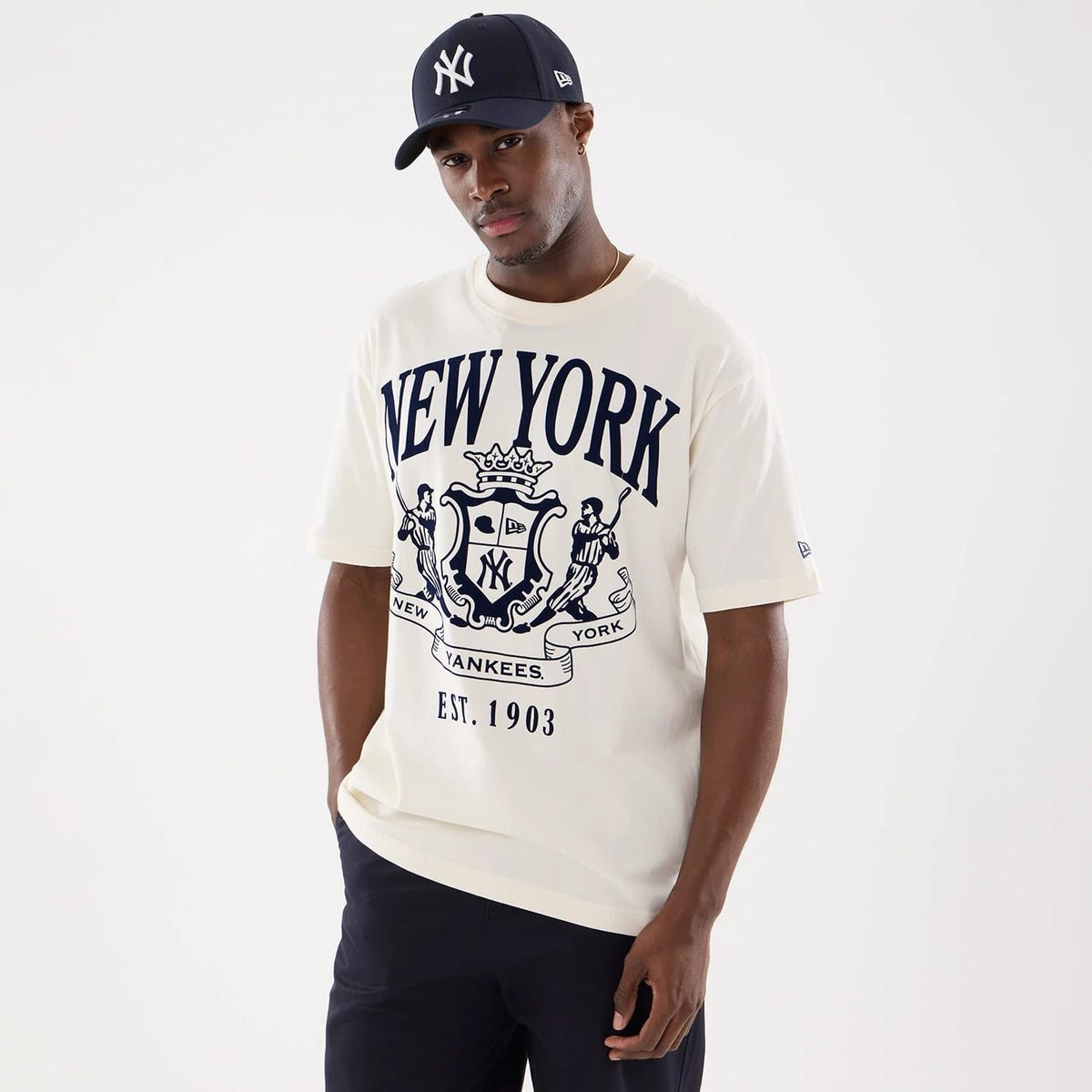 The model is wearing this MLB Life Graphic New York Yankees T-Shirt in light beige. 1