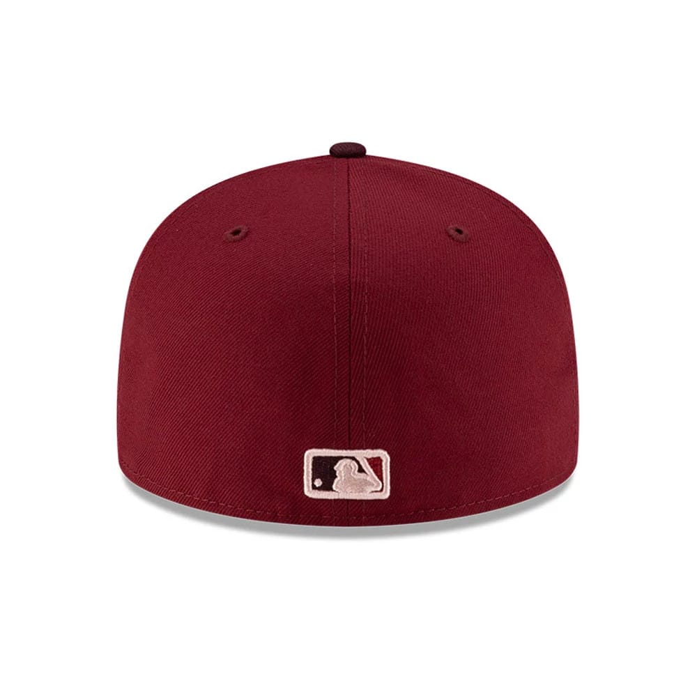 Pictured is this MLB Flourishes New York Yankees 59FIFTY Fitted cap in dark red. 7