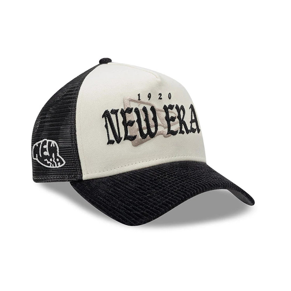 New Era Old English White New Era 9FORTY A-Frame Cap, three-quarter view showing black raised embroidery of 1920 New Era on the cream front panel, a black visor with textured detail, and a white New Era logo on the black mesh side panel.
