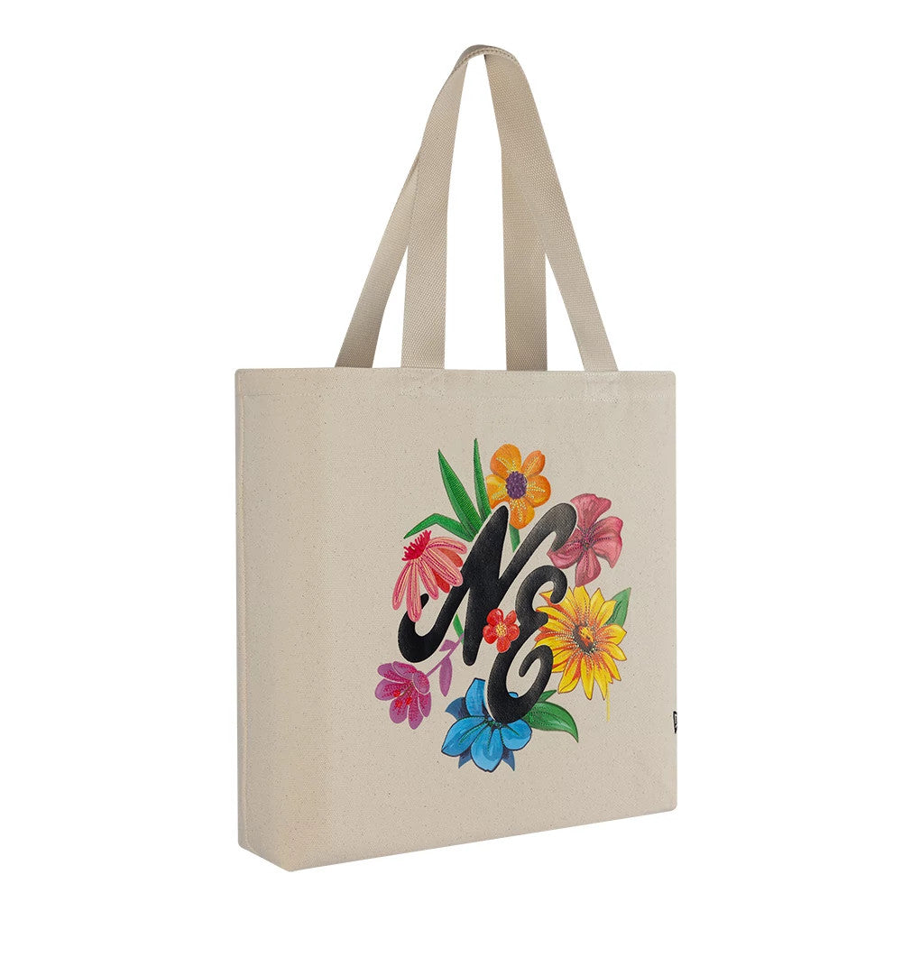 Pictured is this New Era Graphic Tote Bag in light beige. 3