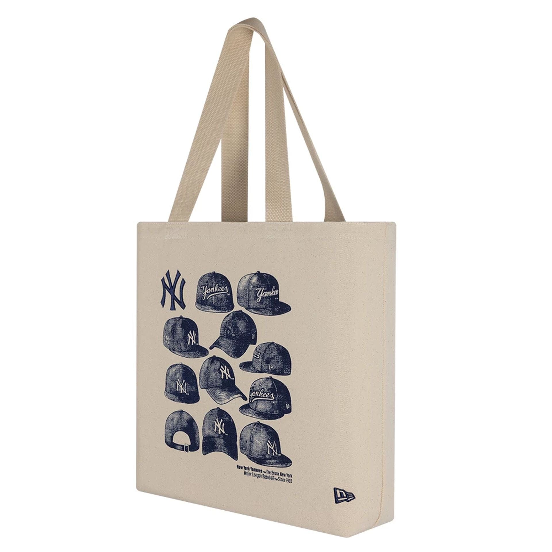 Pictured is this MLB Cap Graphic New York Yankees Tote Bag in light beige. 1