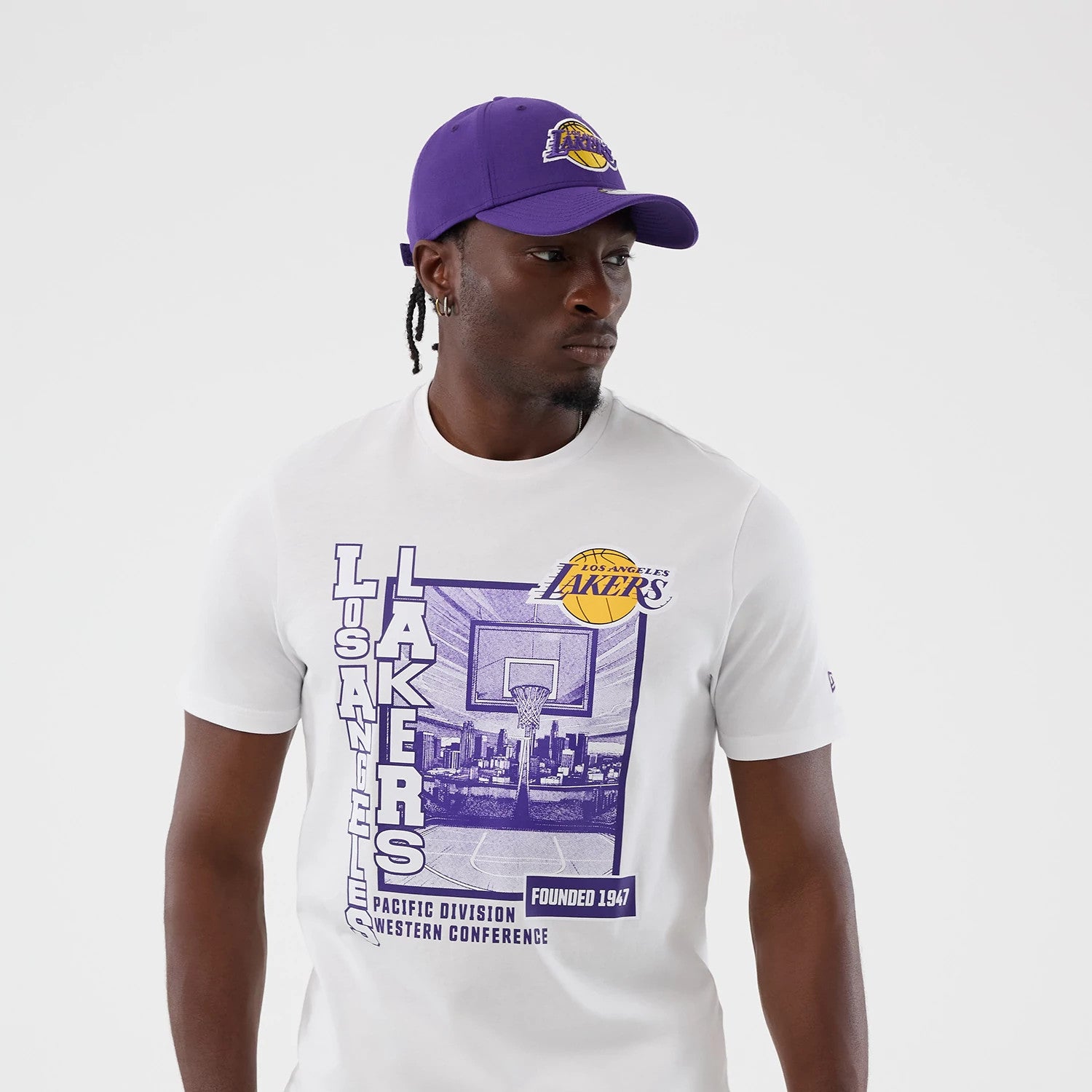 The model is wearing this NBA Graphic LA Lakers T-Shirt in white. 4