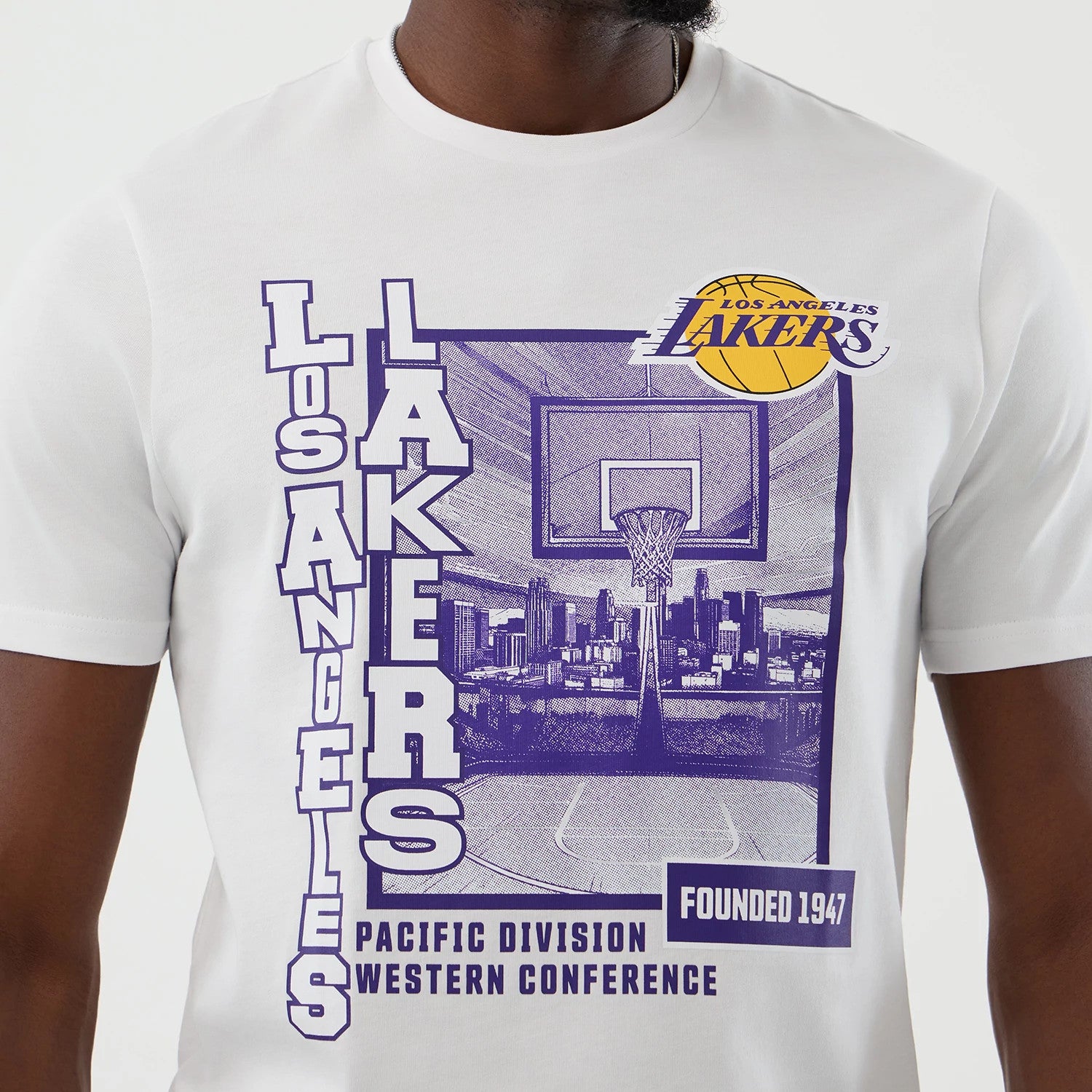 The model is wearing this NBA Graphic LA Lakers T-Shirt in white. 3