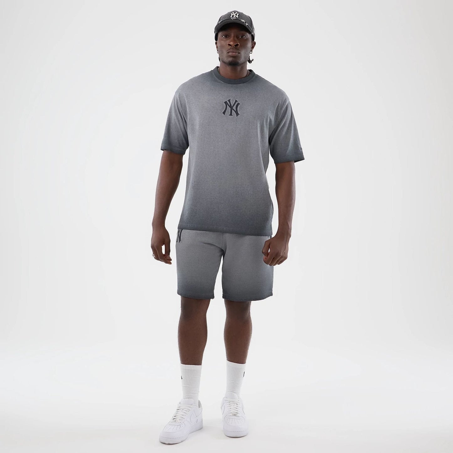 The model is wearing this MLB Washed Logo New York Yankees T-Shirt in black. 8