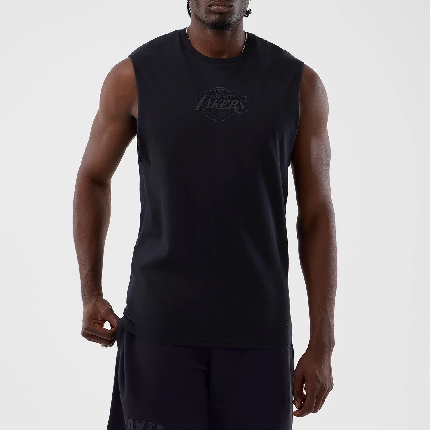 The model is wearing this NBA Core Plus LA Lakers Vest in navy. 3