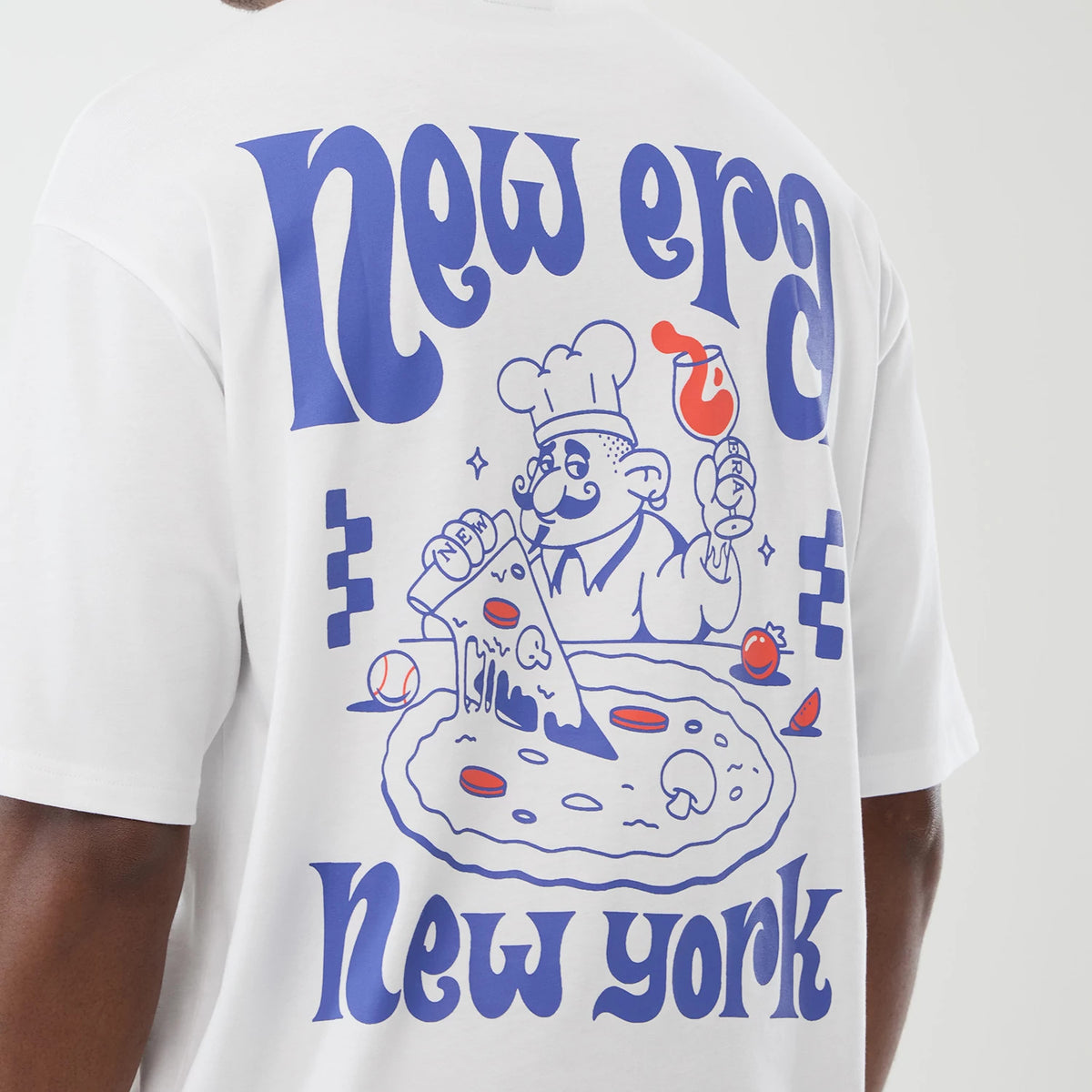 The model is wearing this New Era Fun Pizza Graphic Oversized T-Shirt in white. 4