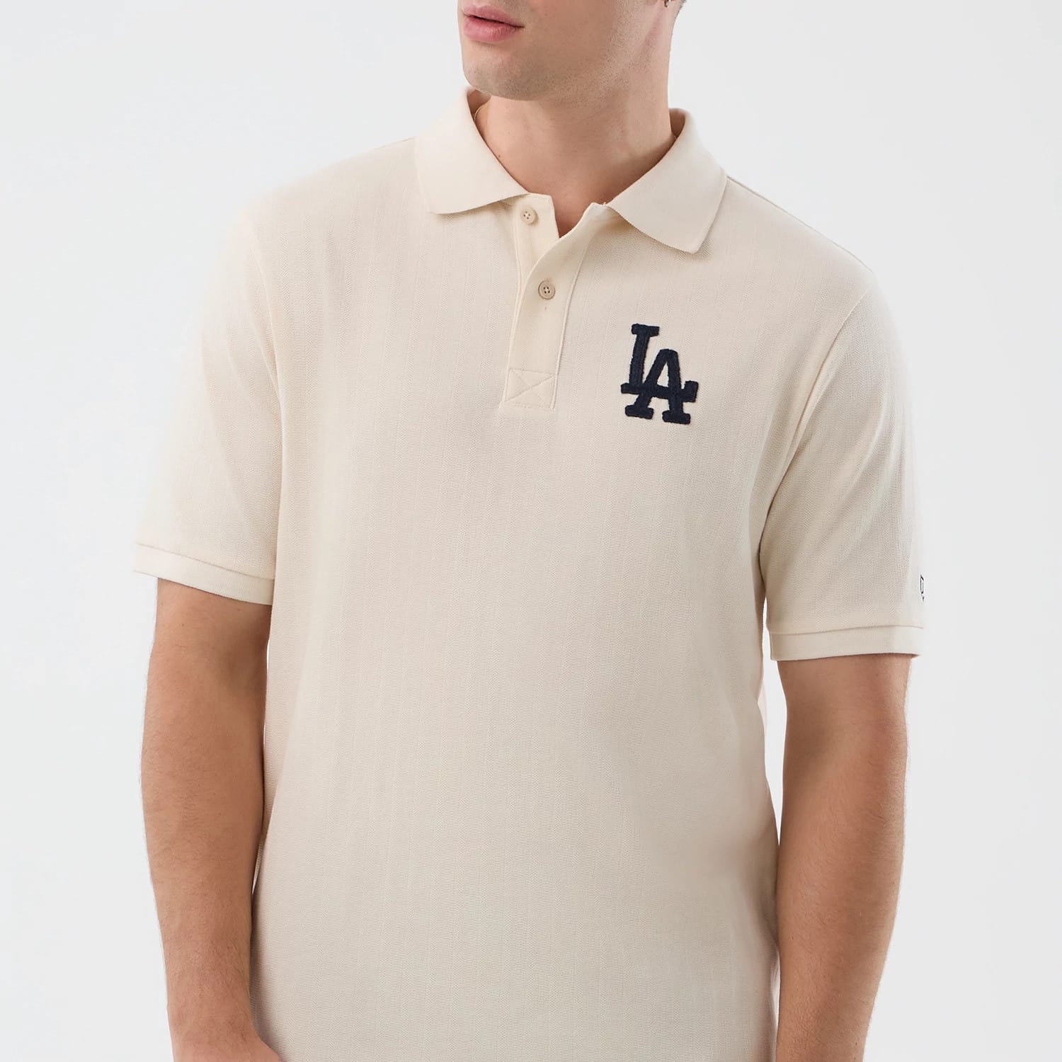 The model is wearing this MLB Rib LA Dodgers Polo T-Shirt in open white. 4